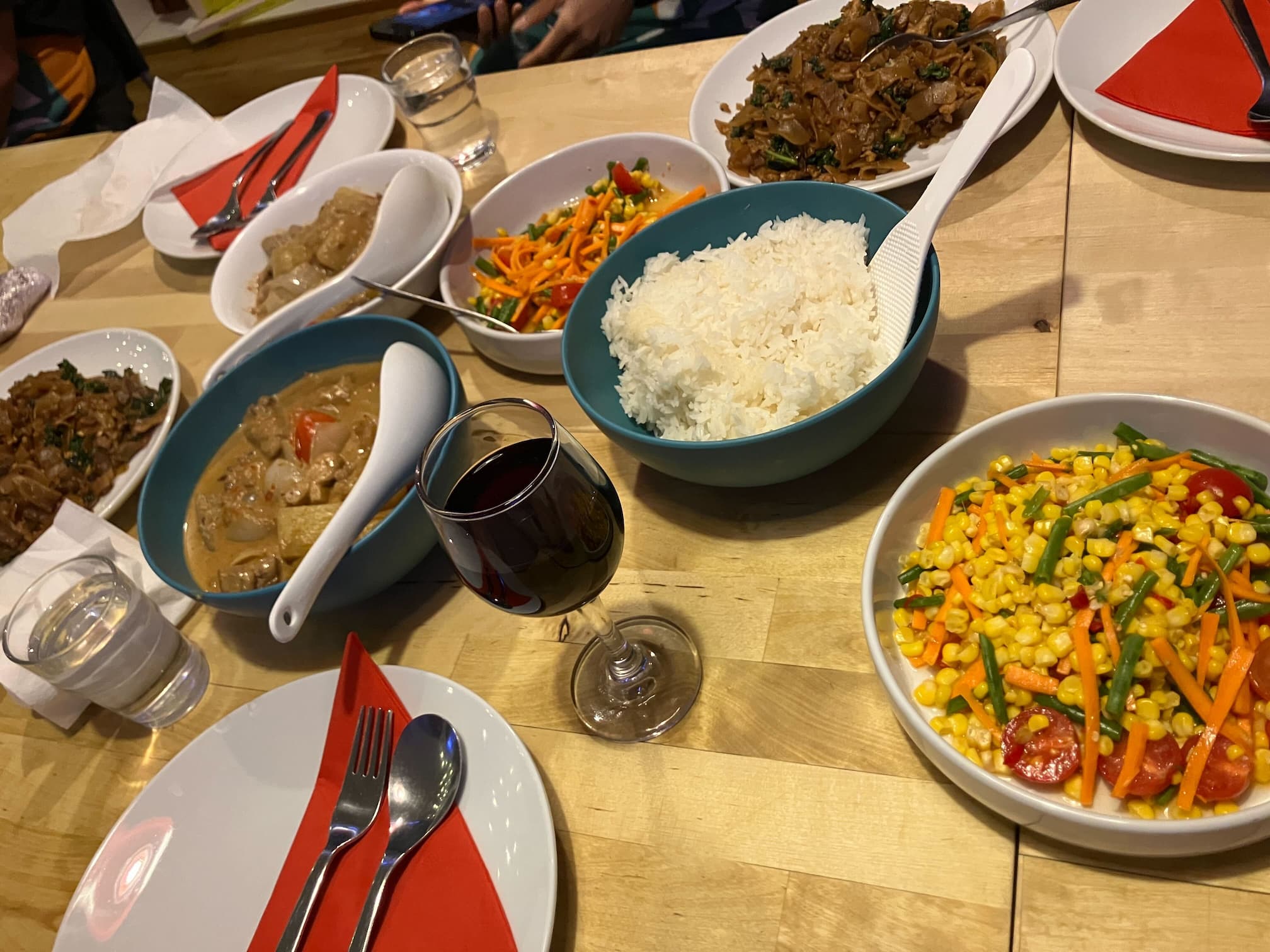 Pad see ew moo, Massaman curry, Thai corn salad and rice 